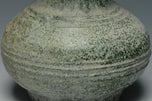 A HAN DYNASTY GREEN GLAZED HU SHAPED VASE