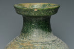 A HAN DYNASTY GREEN GLAZED HU SHAPED VASE