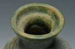 A HAN DYNASTY GREEN GLAZED HU SHAPED VASE