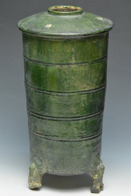 A HAN DYNASTY GREEN GLAZED POTTERY MODEL OF A GRANARY