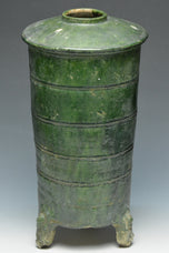 A HAN DYNASTY GREEN GLAZED POTTERY MODEL OF A GRANARY