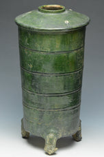 A HAN DYNASTY GREEN GLAZED POTTERY MODEL OF A GRANARY