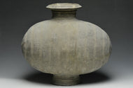 A LARGE HAN DYNASTY POTTERY COCOON JAR