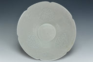 A SONG DYNASTY HUTIAN QINGBAI CARVED BOYS LOBED BOWL