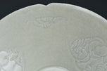 A SONG DYNASTY HUTIAN QINGBAI CARVED BOYS LOBED BOWL