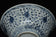 A MING DYNASTY BLUE AND WHITE BOWL 16TH CENTURY