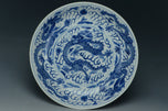 A BLUE AND WHITE DRAGON DISH KANGXI MARK 19TH CENTURY