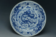 A BLUE AND WHITE DRAGON DISH KANGXI MARK 19TH CENTURY