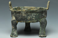 A SPRING AND AUTUMN PERIOD ARCHAIC BRONZE DING