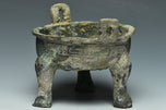 A SPRING AND AUTUMN PERIOD ARCHAIC BRONZE DING