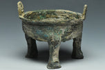 A SPRING AND AUTUMN PERIOD ARCHAIC BRONZE DING