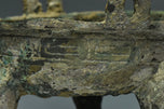 A SPRING AND AUTUMN PERIOD ARCHAIC BRONZE DING
