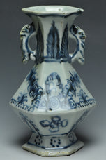 A MING DYNASTY BLUE AND WHITE HANDLED VASE 15TH CENTURY
