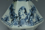 A MING DYNASTY BLUE AND WHITE HANDLED VASE 15TH CENTURY