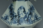 A MING DYNASTY BLUE AND WHITE HANDLED VASE 15TH CENTURY