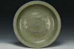 A LARGE YUAN DYNASTY LONGQUAN CELADON DRAGON DISH
