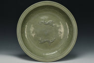 A LARGE YUAN DYNASTY LONGQUAN CELADON DRAGON DISH