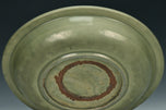 A LARGE YUAN DYNASTY LONGQUAN CELADON DRAGON DISH
