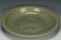 A LARGE YUAN DYNASTY LONGQUAN CELADON DRAGON DISH