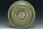 A LARGE YUAN DYNASTY LONGQUAN CELADON DRAGON DISH
