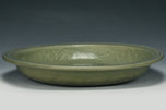 A LARGE YUAN DYNASTY LONGQUAN CELADON DRAGON DISH