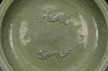 A LARGE YUAN DYNASTY LONGQUAN CELADON DRAGON DISH