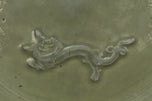 A LARGE YUAN DYNASTY LONGQUAN CELADON DRAGON DISH