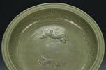 A LARGE YUAN DYNASTY LONGQUAN CELADON DRAGON DISH