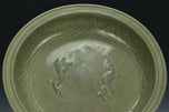 A LARGE YUAN DYNASTY LONGQUAN CELADON DRAGON DISH