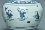 A MING DYNASTY BLUE AND WHITE BOYS JAR 16TH CENTURY AND BOX