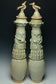A PAIR OF SONG DYNASTY QINGBAI FUNERARY VASES AND COVERS