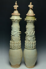 A PAIR OF SONG DYNASTY QINGBAI FUNERARY VASES AND COVERS