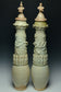 A PAIR OF SONG DYNASTY QINGBAI FUNERARY VASES AND COVERS