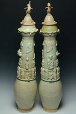 A PAIR OF SONG DYNASTY QINGBAI FUNERARY VASES AND COVERS