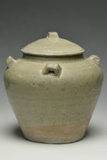 A JIN DYNASTY CELADON GLAZED JAR AND COVER