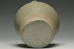 A JIN DYNASTY CELADON GLAZED JAR AND COVER