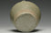 A JIN DYNASTY CELADON GLAZED JAR AND COVER