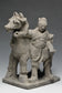A YUAN DYNASTY POTTERY HORSE WITH GROOM