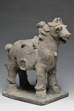 A YUAN DYNASTY POTTERY HORSE WITH GROOM