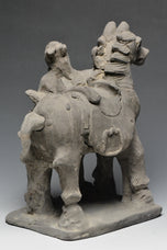 A YUAN DYNASTY POTTERY HORSE WITH GROOM