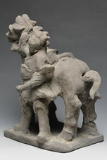 A YUAN DYNASTY POTTERY HORSE WITH GROOM