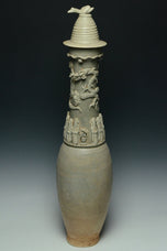 A SONG DYNASTY QINGBAI FUNERARY VASE AND COVER