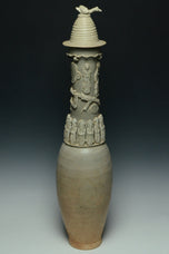 A SONG DYNASTY QINGBAI FUNERARY VASE AND COVER