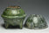 A HAN DYNASTY GREEN GLAZED DING AND COVER