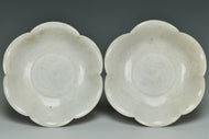 A PAIR OF SONG DYNASTY CARVED QINGBAI FOLIATE-RIM DISHES