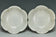 A PAIR OF SONG DYNASTY CARVED QINGBAI FOLIATE-RIM DISHES