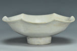 A PAIR OF SONG DYNASTY CARVED QINGBAI FOLIATE-RIM DISHES