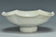 A PAIR OF SONG DYNASTY CARVED QINGBAI FOLIATE-RIM DISHES