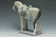 A MING DYNASTY PAINTED POTTERY HORSE