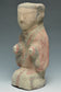 A HAN DYNASTY PAINTED POTTERY KNEELING ATTENDANT